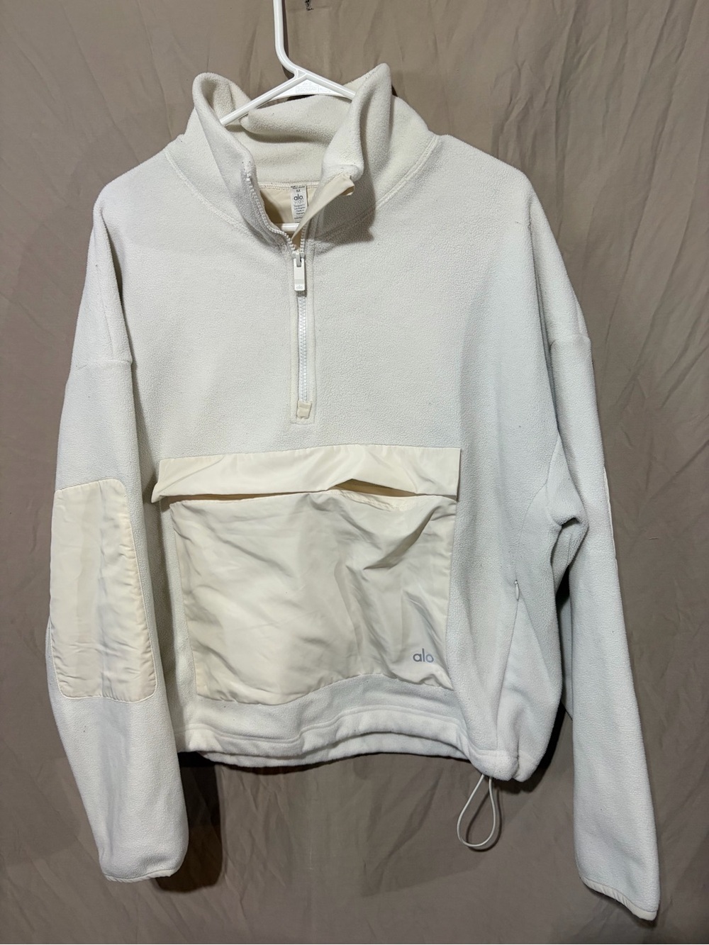 Alo Yoga off-white half-zip ski jacket